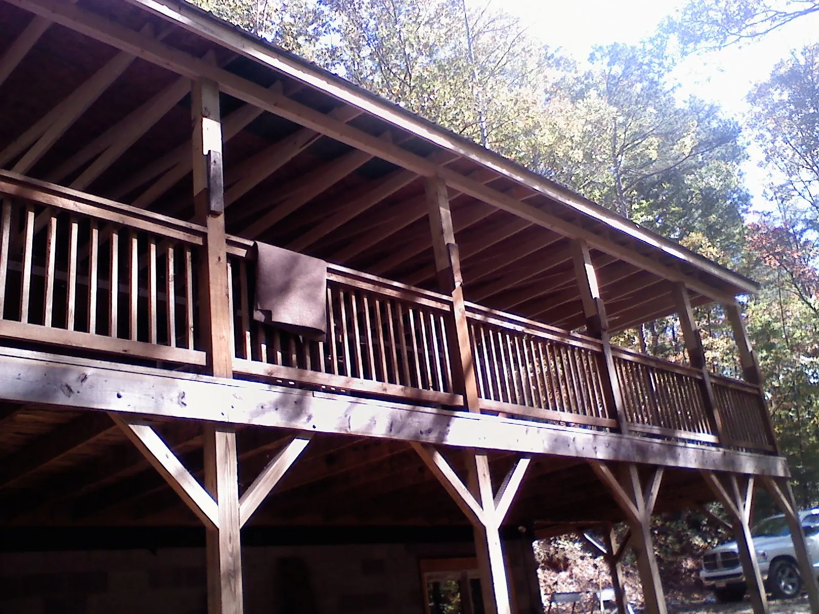 Timber framing under a new elevated porch and deck — Roof Leak Repair in Donahue by Roofing Brothers